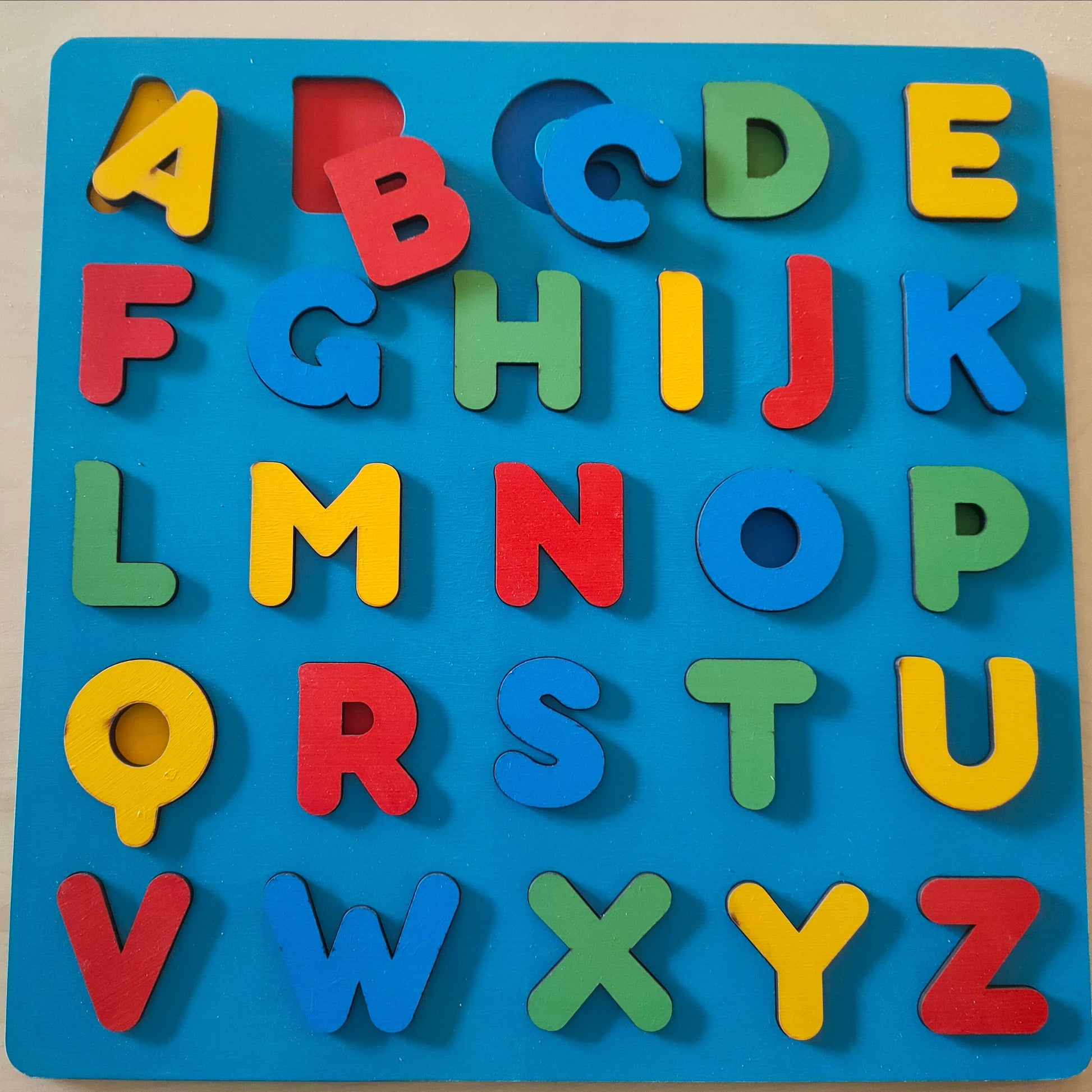 Multi colour alphabet puzzle