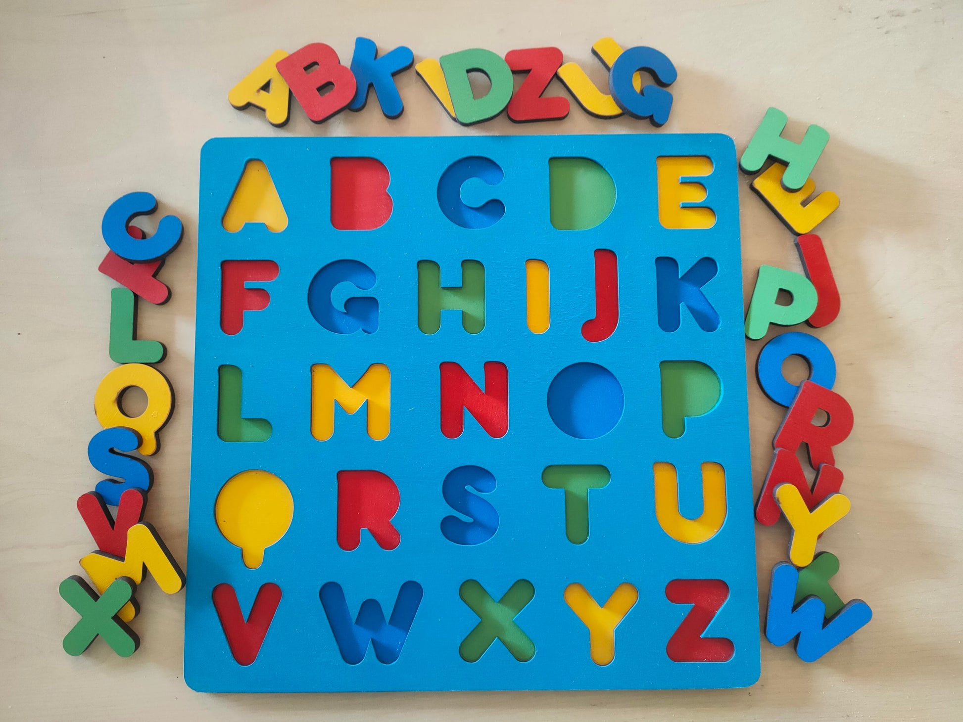 Multi colour alphabet puzzle