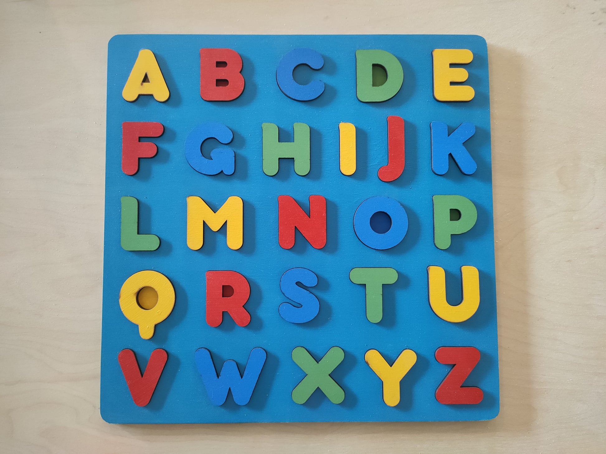 Multi colour alphabet puzzle